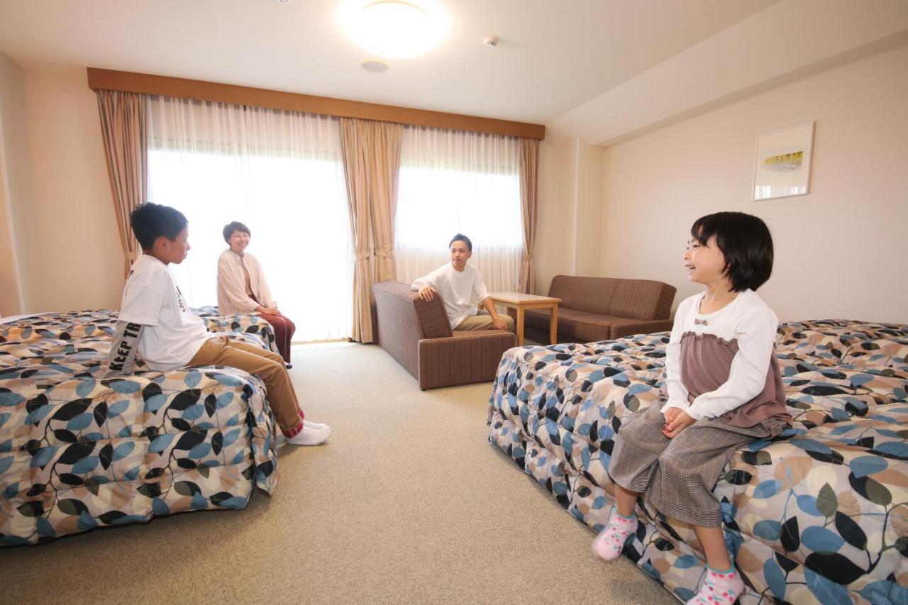 Hotel Familio Sadoaikawa Bagian luar foto