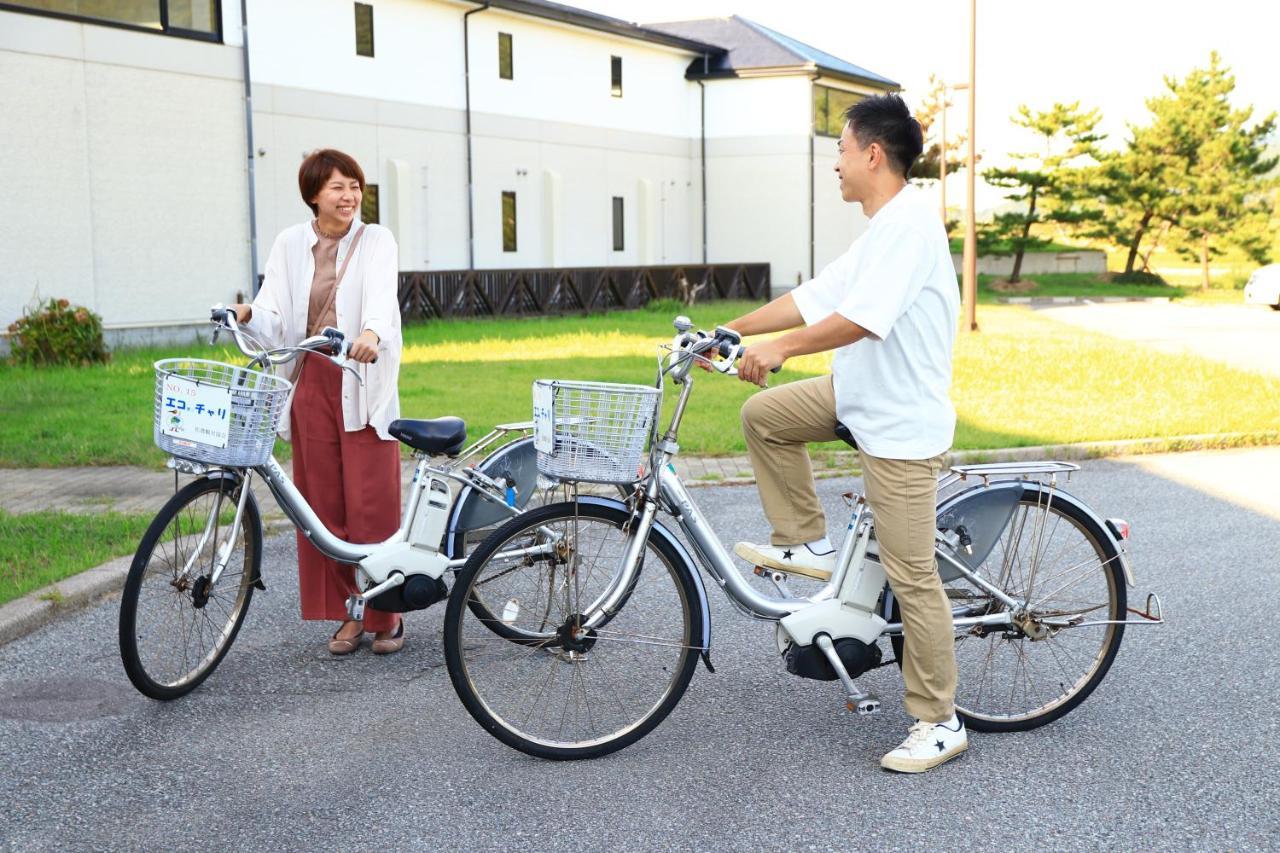 Hotel Familio Sadoaikawa Bagian luar foto