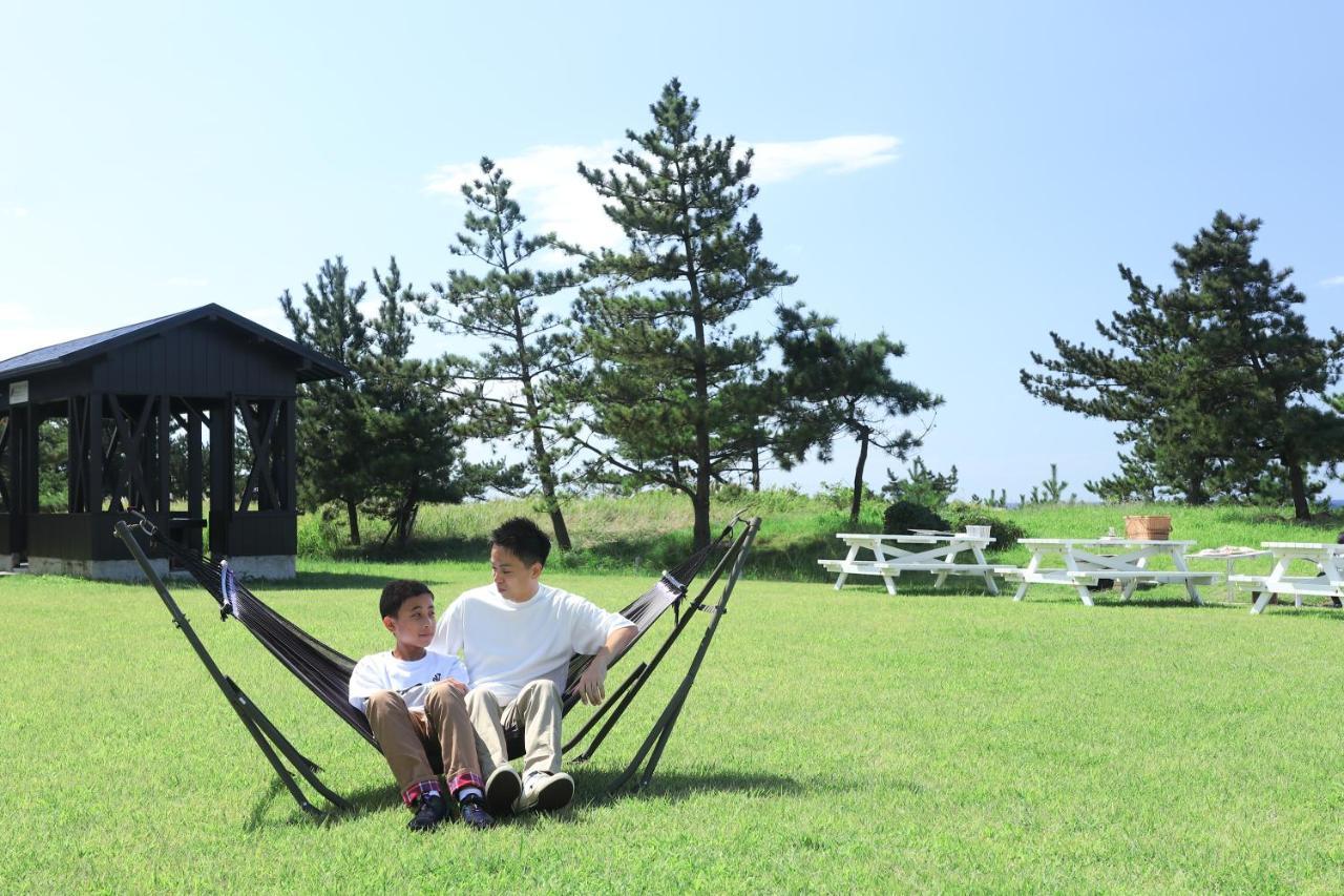 Hotel Familio Sadoaikawa Bagian luar foto